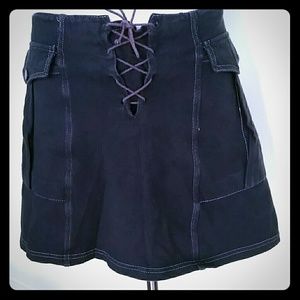 Kookai black 2 pocket lace up skirt .